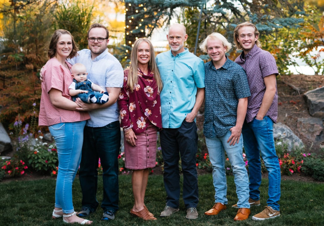 Dr. Andrew Erickson and his family smiling together in West Jordan.